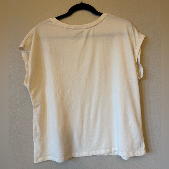 Elegant Cream Tee with Floral Accents - Picture 2 of 5